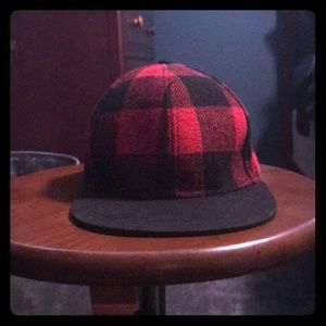 A plaid hat with adjustable SnapBack